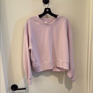 Lululemon  Crew Neck Sweater.  Cropped and oversized.  Pale pink,  silky